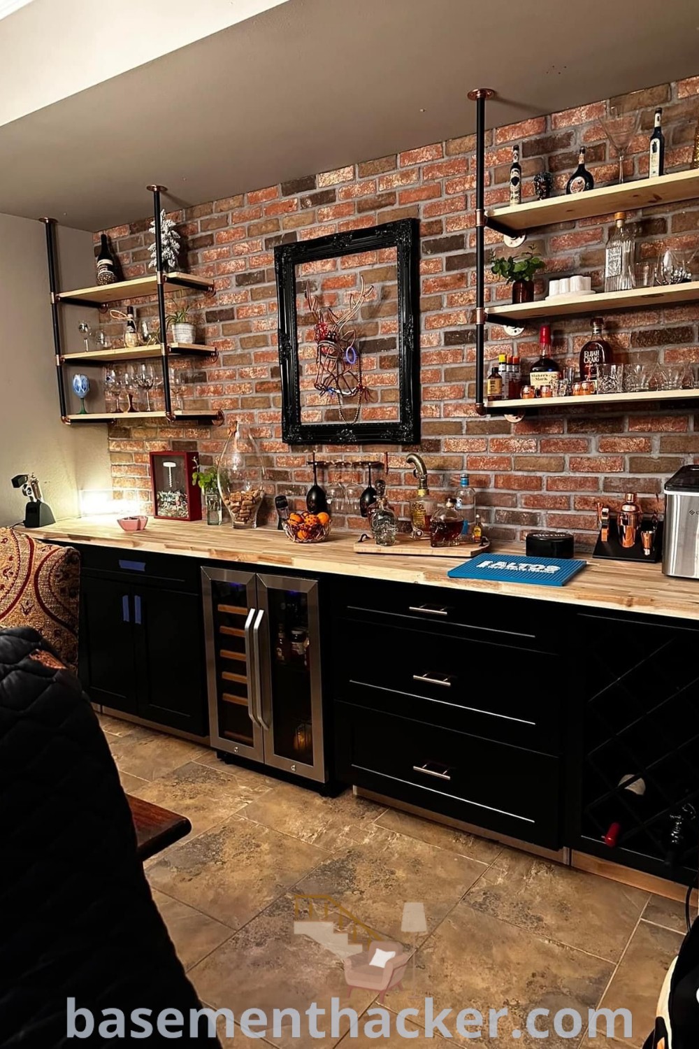 A kitchen with brick walls and shelves showcasing a stylish bar setup, ideal for innovative basement makeovers and cozy entertaining. Explore the best brick wall bar ideas for your home to create a functional and stunning bonus space. Find inspiration at basementhacker.com.