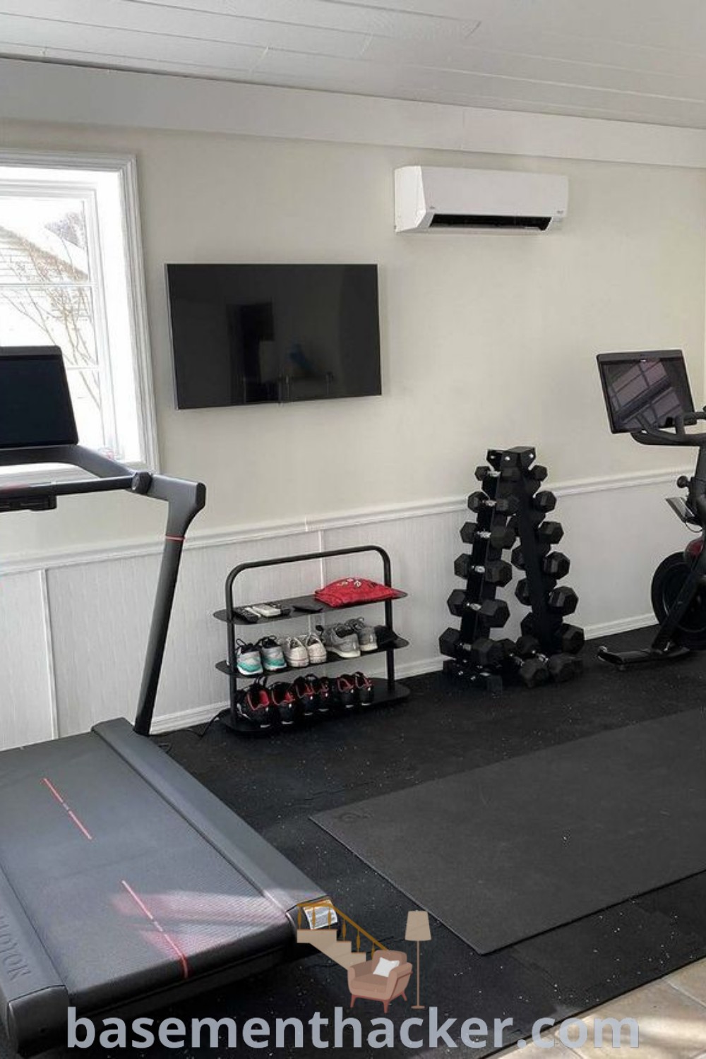 A stylish home gym featuring treadmills, exercise equipment, and a flat-screen TV, ideal for an at-home workout room. This design showcases innovative basement makeover ideas, perfect for creating a cozy, organized space for the whole family. For more inspiration, visit basementhacker.com.