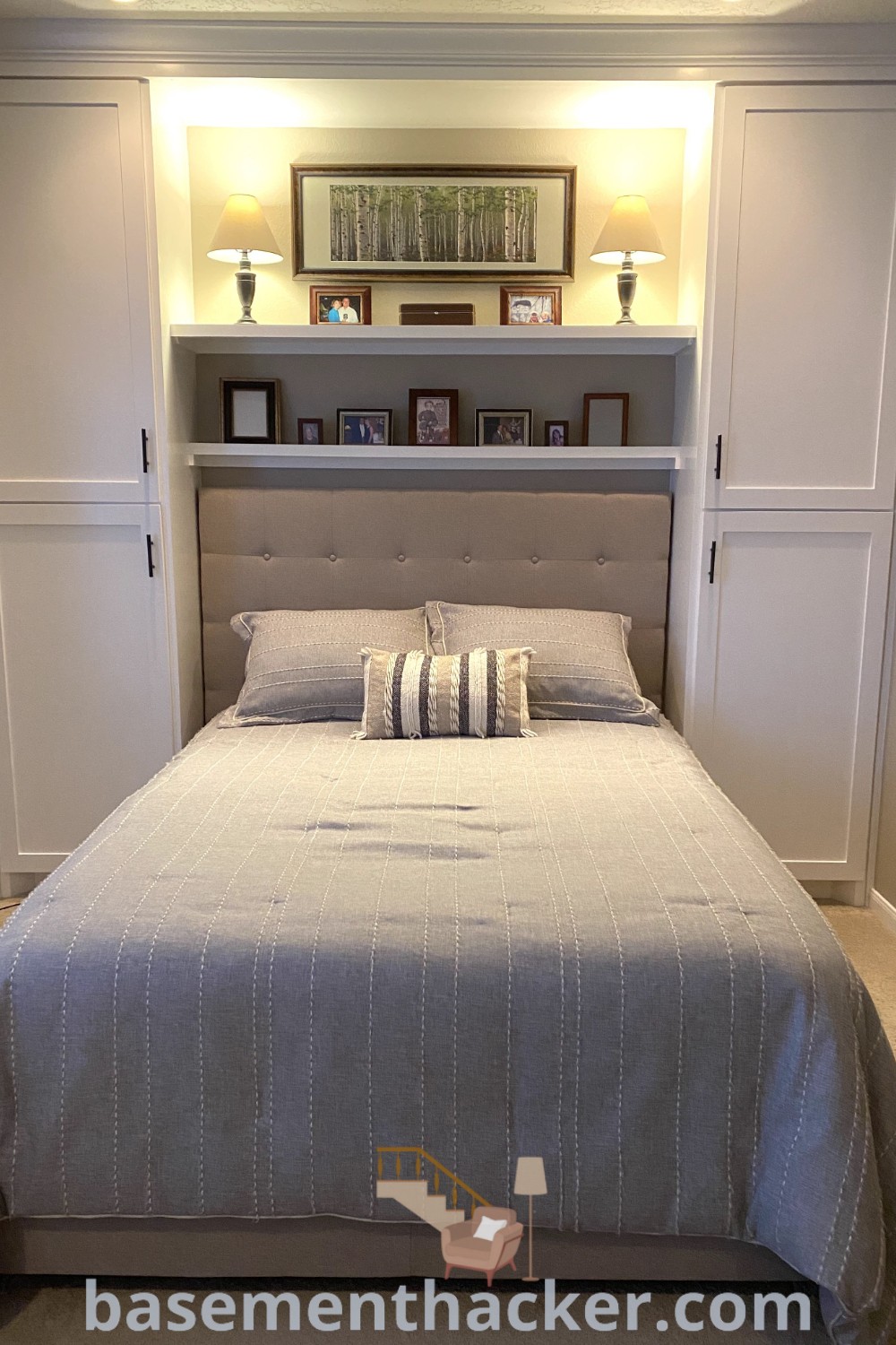 A neatly made bed in a smaller bedroom with built-in closet storage and wardrobes surrounding it. This design illustrates innovative ideas for designing a stylish and functional home, offering a cozy and organized space. Explore more stylish bedroom solutions at basementhacker.com.