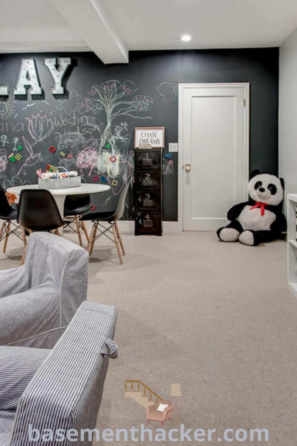 A colorful playroom featuring shelves stacked with toys and books, designed for ultimate entertaining and fun. This stylish bonus space encourages creativity and learning for children, showcasing innovative ideas for a cozy and organized home. Explore more at basementhacker.com.