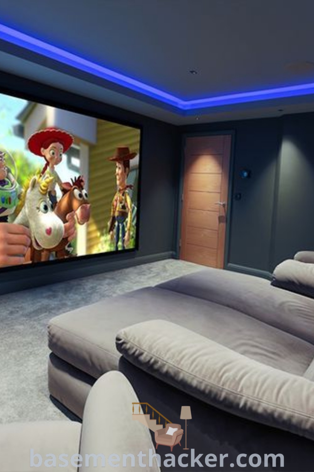 A cozy home theater with two recliners in front of an animated movie on the wall, showcasing innovative ideas for designing small home theaters. This stylish room design from basementhacker.com emphasizes comfort and decor, perfect for ultimate entertaining and creating a family-friendly atmosphere.