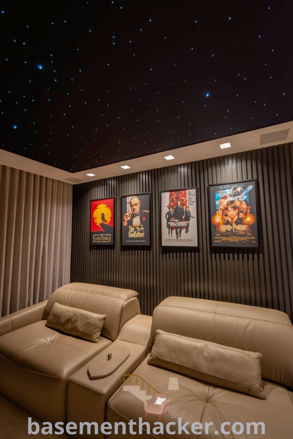 A stylish mini home cinema room featuring a ceiling covered in stars and two couches with pillows, ideal for ultimate entertaining and cozy movie nights. Explore innovative ideas for designing your own cinema room at basementhacker.com.