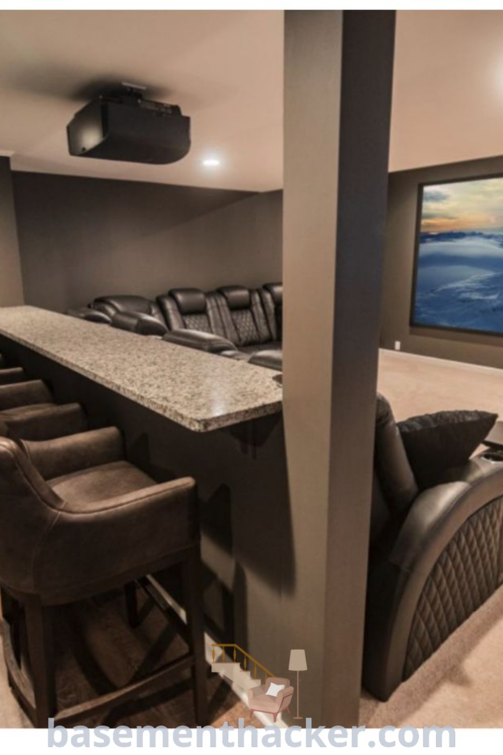 A cozy home theater featuring bar seating and a large screen for ultimate entertaining. This basement design includes innovative ideas for a stylish bonus space, perfect for family movie nights. Discover more design ideas and inspirations at basementhacker.com.
