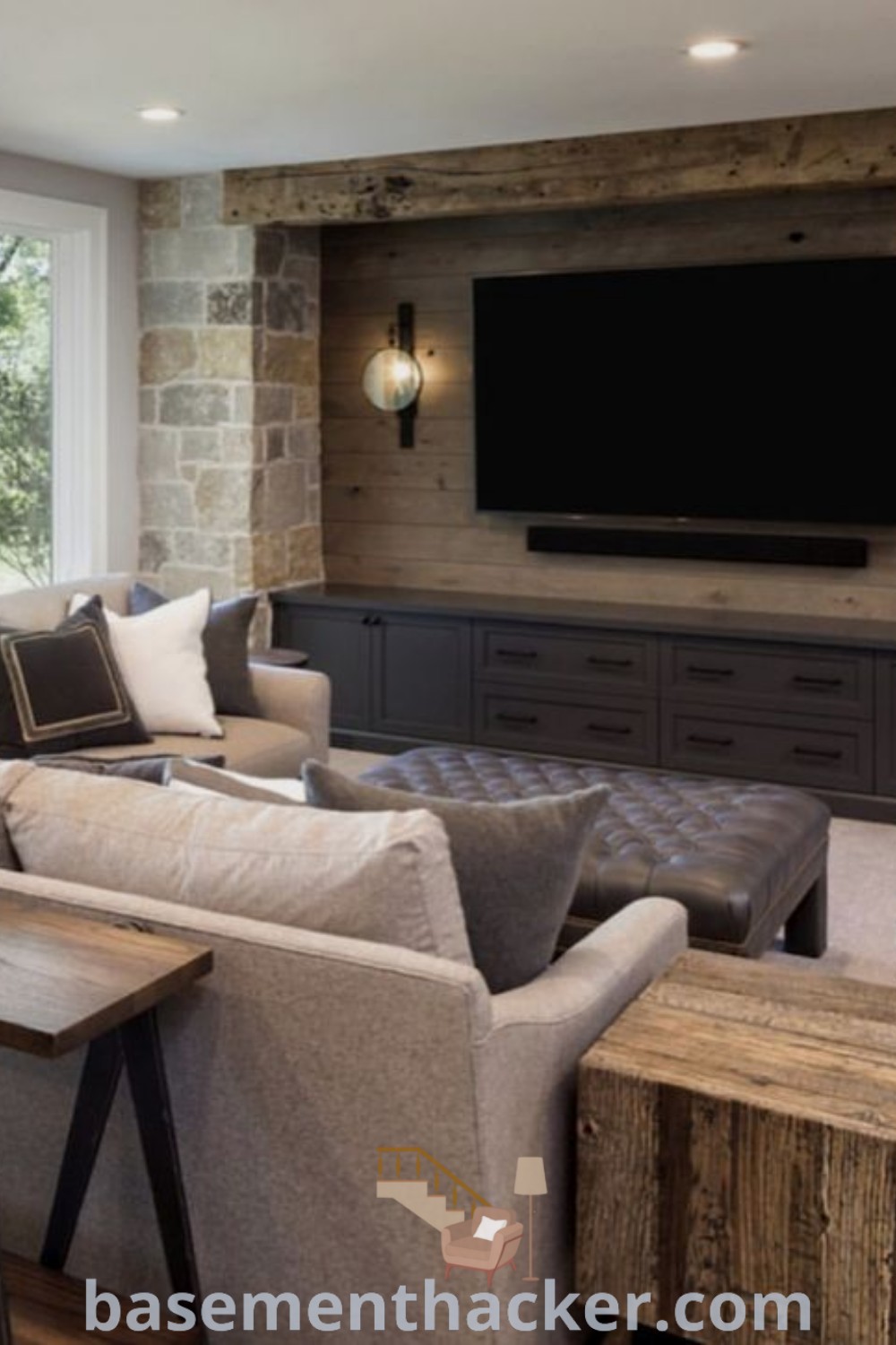 A stylish basement living room featuring furniture, a flat-screen TV mounted over a fireplace, and Rv Curtains. This scene illustrates innovative ideas for designing a cozy and functional space, perfect for ultimate entertaining and family enjoyment. Discover more inspirations for basement makeovers at basementhacker.com.