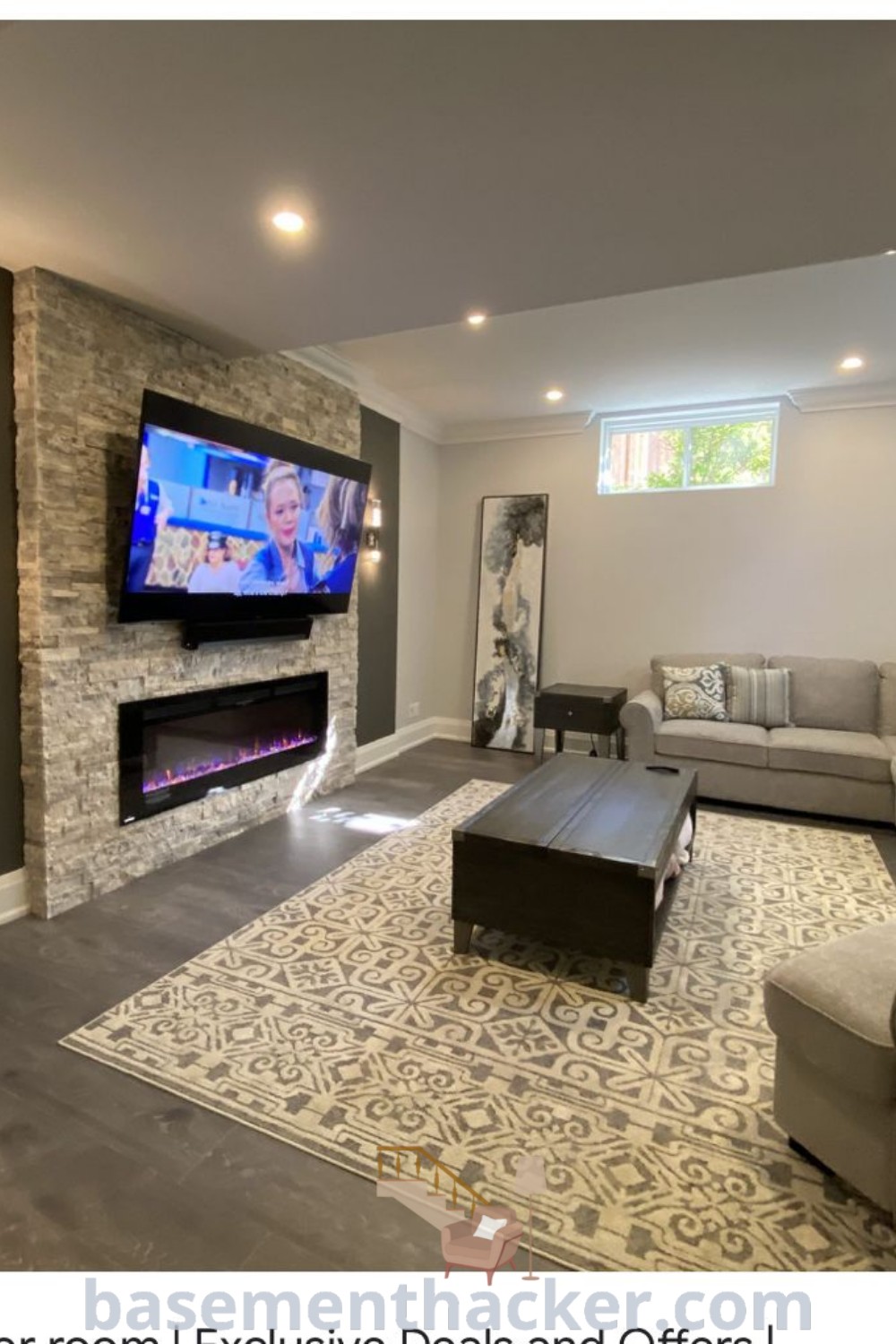 A cozy basement living room with plush couches, a television in the corner, and a fireplace, showcasing stylish ideas for a functional family space. Explore innovative basement makeover ideas for an organized and inviting atmosphere at basementhacker.com.