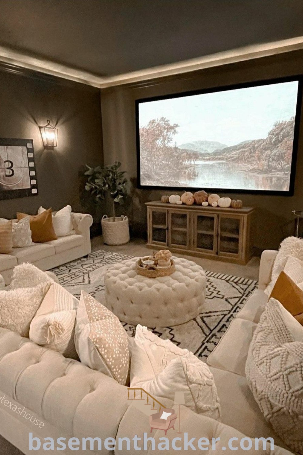 A stylish living room with a flat-screen TV mounted on the wall, showcasing innovative ideas for designing cozy basement living rooms and home cinema rooms. Perfect for ultimate entertaining, this basement makeover incorporates functional aesthetics for families. Explore more basementhacker.com for inspiring design ideas.