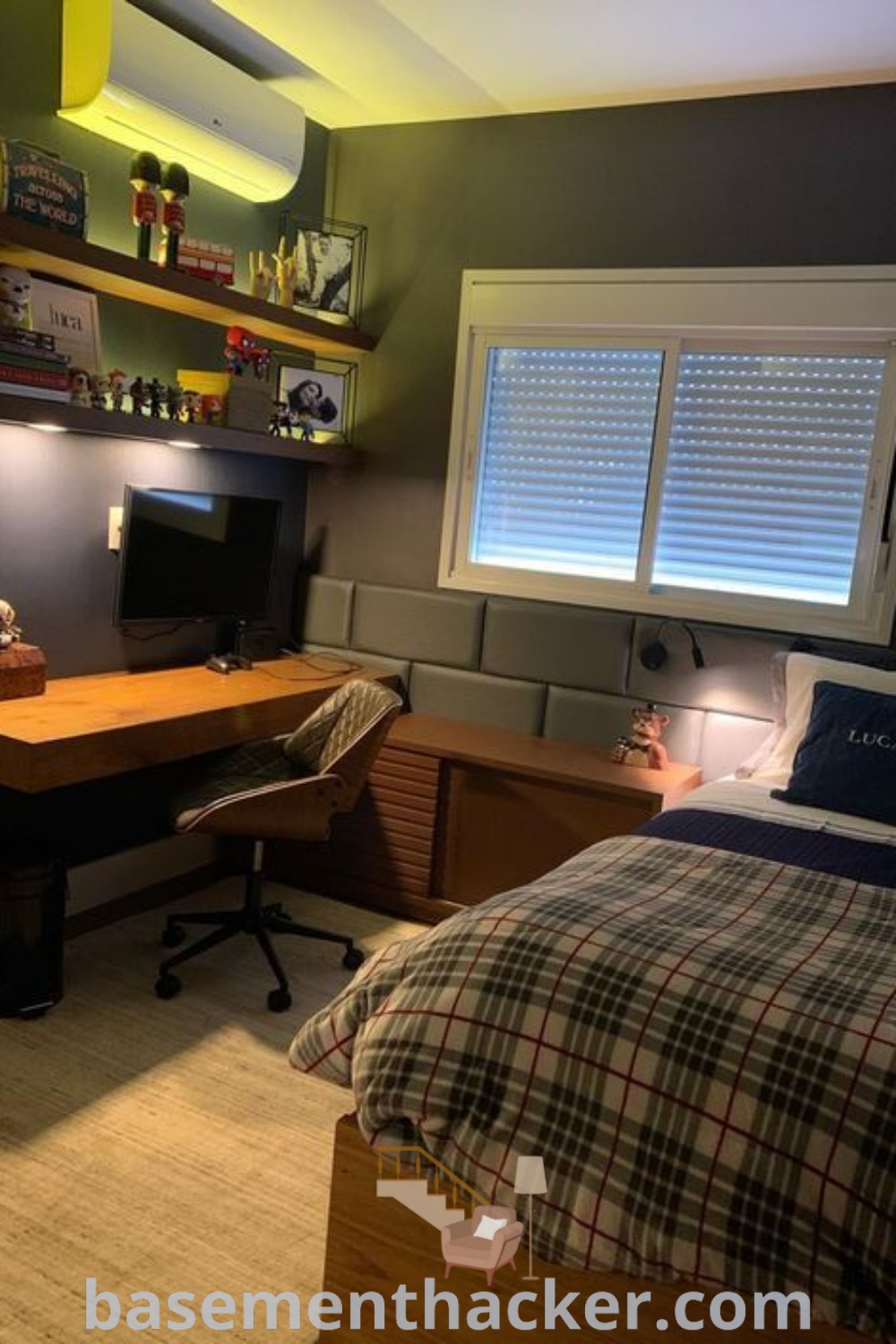 A vibrant bedroom gaming room with a sleek desk and cozy bed, showcasing innovative ideas for designing a stylish and functional space. This mens bedroom decor combines modern aesthetics with practical elements for both gaming and study, featuring ideas for a cozy and organized home. Explore more design inspirations at basementhacker.com.