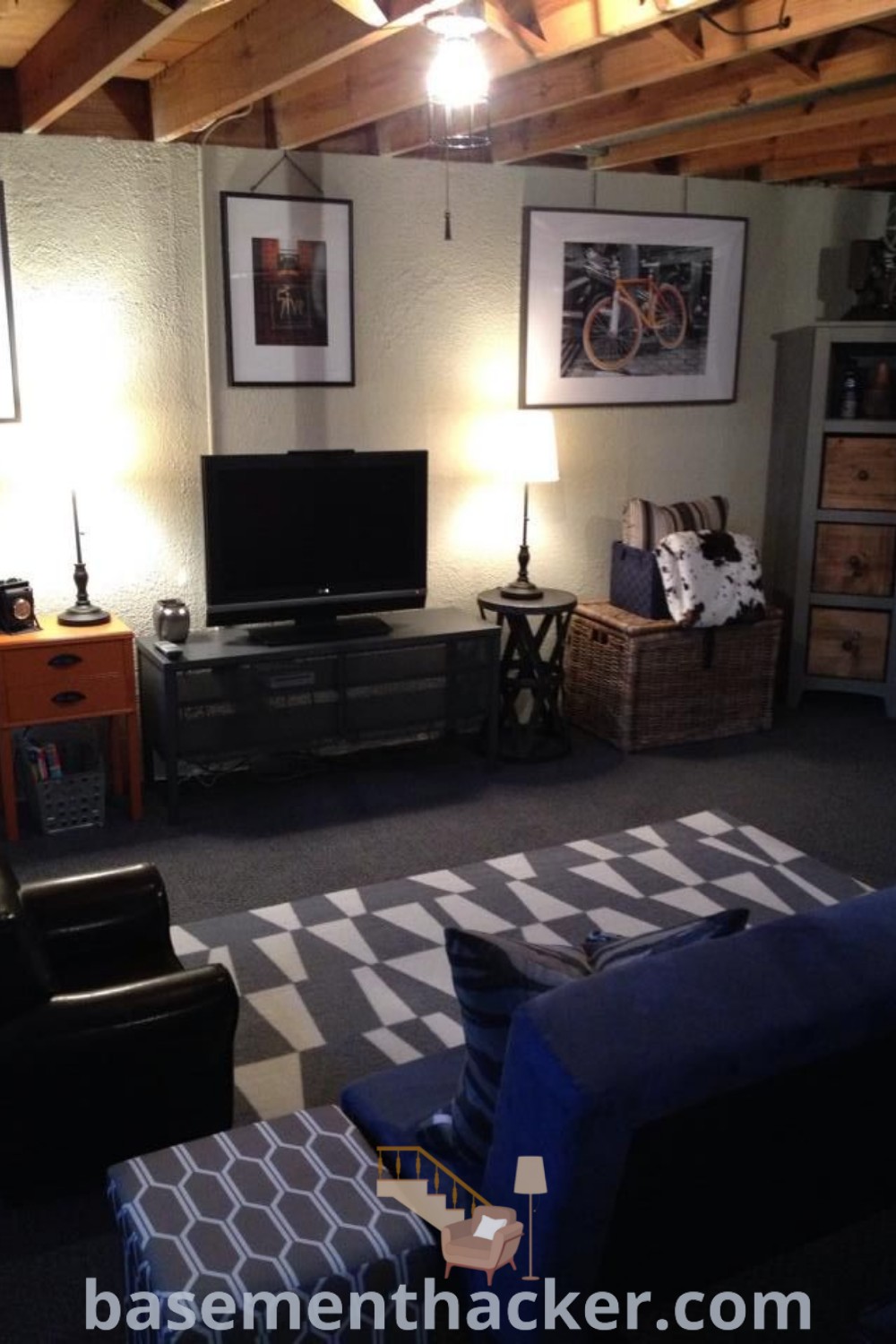 A clean and inviting basement living room ready for its new owner, featuring innovative ideas for designing a stylish and functional home. This space showcases comfortable furnishings and creative decor suggestions for ultimate entertaining and cozy family gatherings. Discover more basement living room ideas at basementhacker.com.