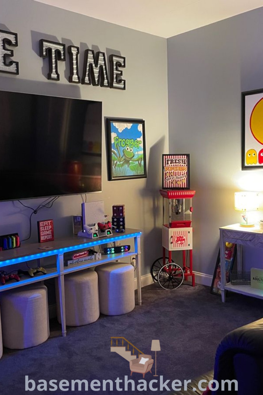 A cozy living room transformed into a game room with furniture and a flat-screen TV, featuring innovative ideas for designing playrooms and game rooms. Discover awesome family video game room concepts and basement hunker.com for additional inspiration on stylish designs and functional layouts.