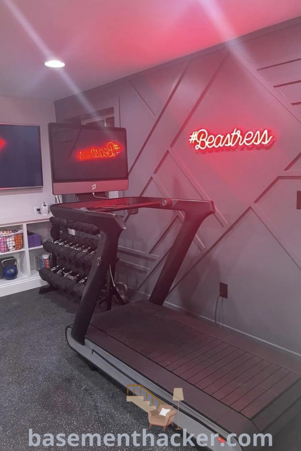 A stylish home gym featuring a treadmill adorned with neon signs, showcasing innovative ideas for designing a cute workout room. This vibrant decor provides inspiration for basement workout rooms and is perfect for anyone seeking ideas to upgrade their fitness space. Find more at basementhacker.com.