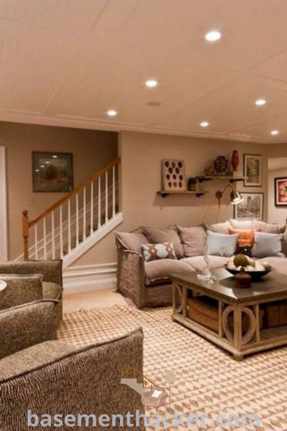 A cozy living room in a basement filled with stylish furniture and a staircase in the background, showcasing innovative basement makeover ideas for a stunning revamp. This space offers several best basement remodeling ideas for a functional home design, perfect for family gatherings. For more decor strategies, visit basementhacker.com.