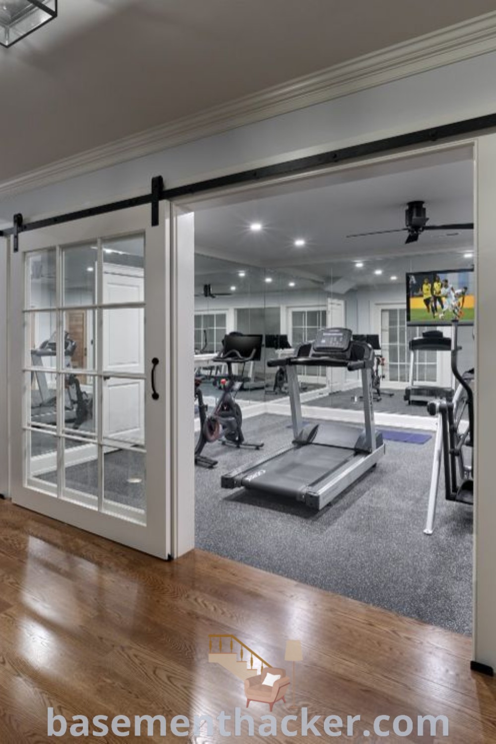 A beautifully designed home gym featuring treadmills and exercise equipment, showcasing a sunroom home gym atmosphere. This modern farmhouse workout room provides innovative ideas for a stylish and functional home design. Discover how to create a space for family fitness and wellness at basementhacker.com.