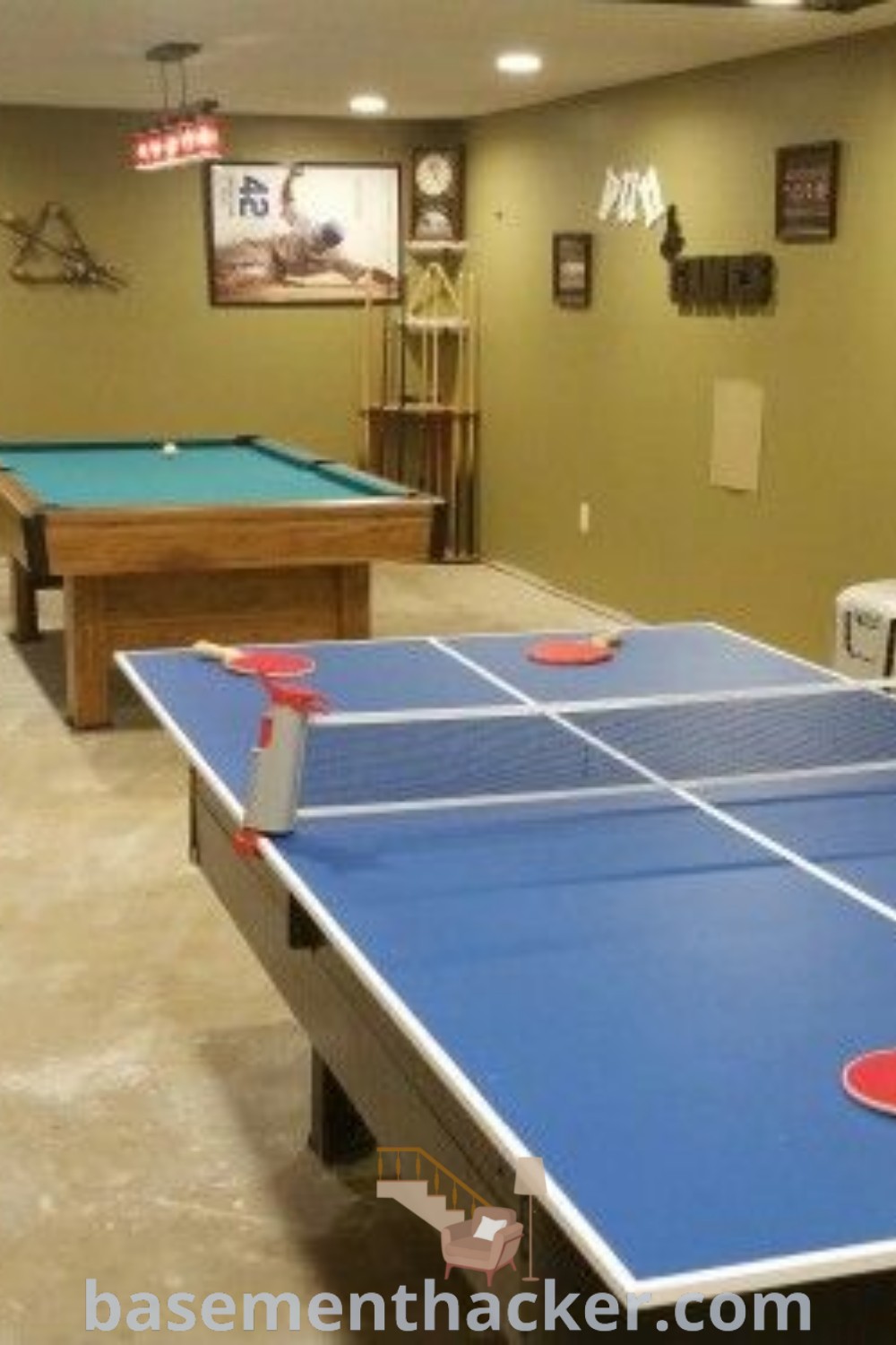 A lively game room with ping pong tables and bar stools designed for ultimate entertaining, showcasing innovative ideas for a stylish and functional basement transformation. This fun-filled space emphasizes family-friendly activities and offers creative design tips for remodeling your home. Discover more ideas at basementhacker.com.