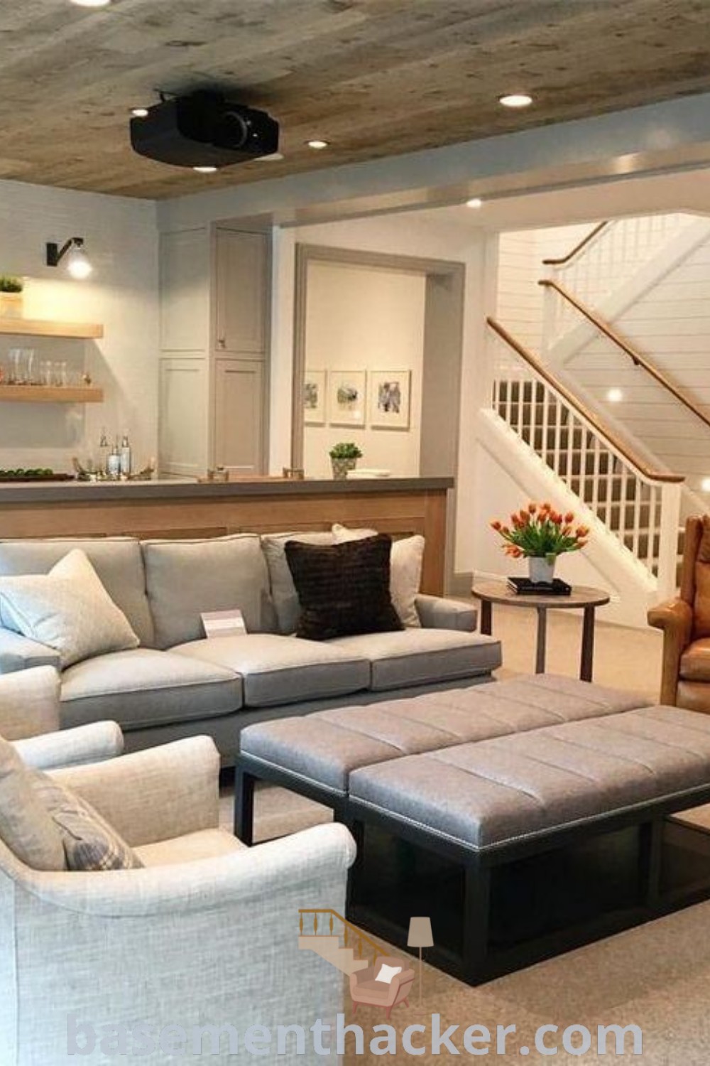 A stunning and clean basement living room designed for ultimate entertaining. This cozy space features stylish decor, game room inspiration, and innovative ideas for redesigning your home. Discover the best basement remodeling ideas for creating a functional, beautiful home at basementhacker.com.