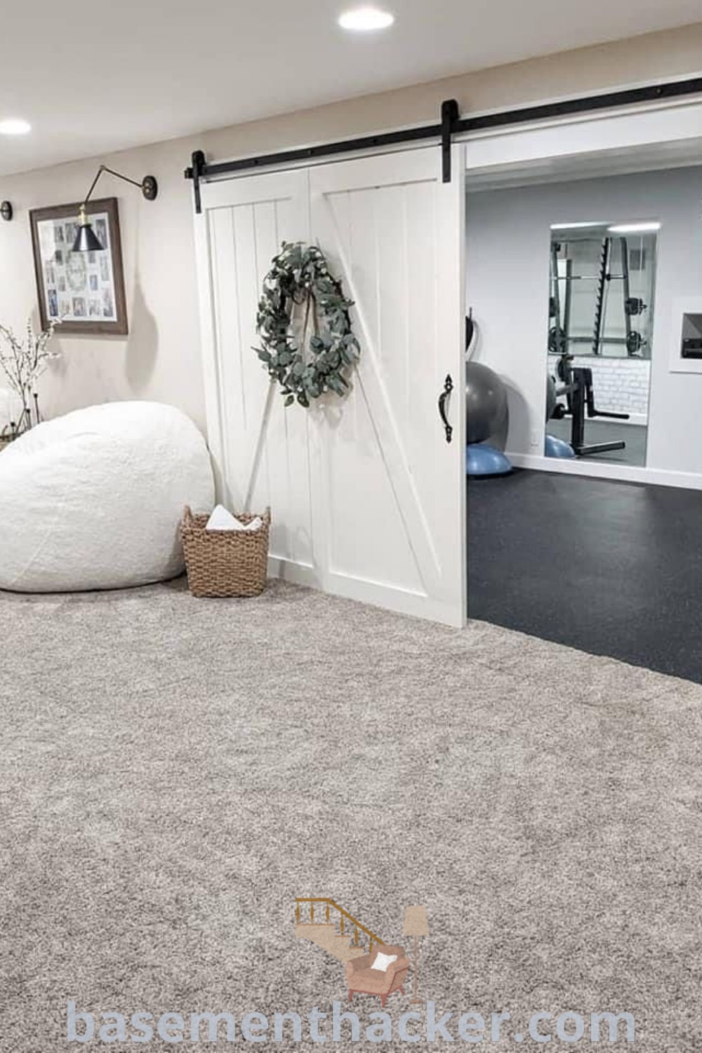 A cozy basement bedroom with two white bean bags on the floor and an open door leading to another room. This space reflects innovative basement makeover ideas for a stylish bonus area, promoting a comfortable and inviting home environment. For more design inspirations, visit basementhacker.com.