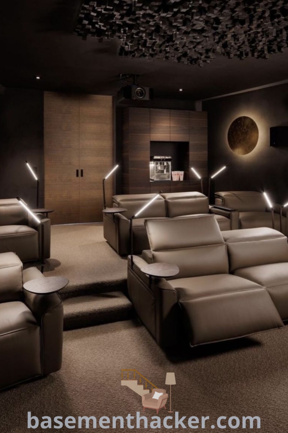 An empty theater room showcasing two recliners at the center with ceiling lights, making for an ideal small theater room design. Discover awesome home theater decor ideas and innovative concepts for stylish bonus spaces at basementhacker.com.