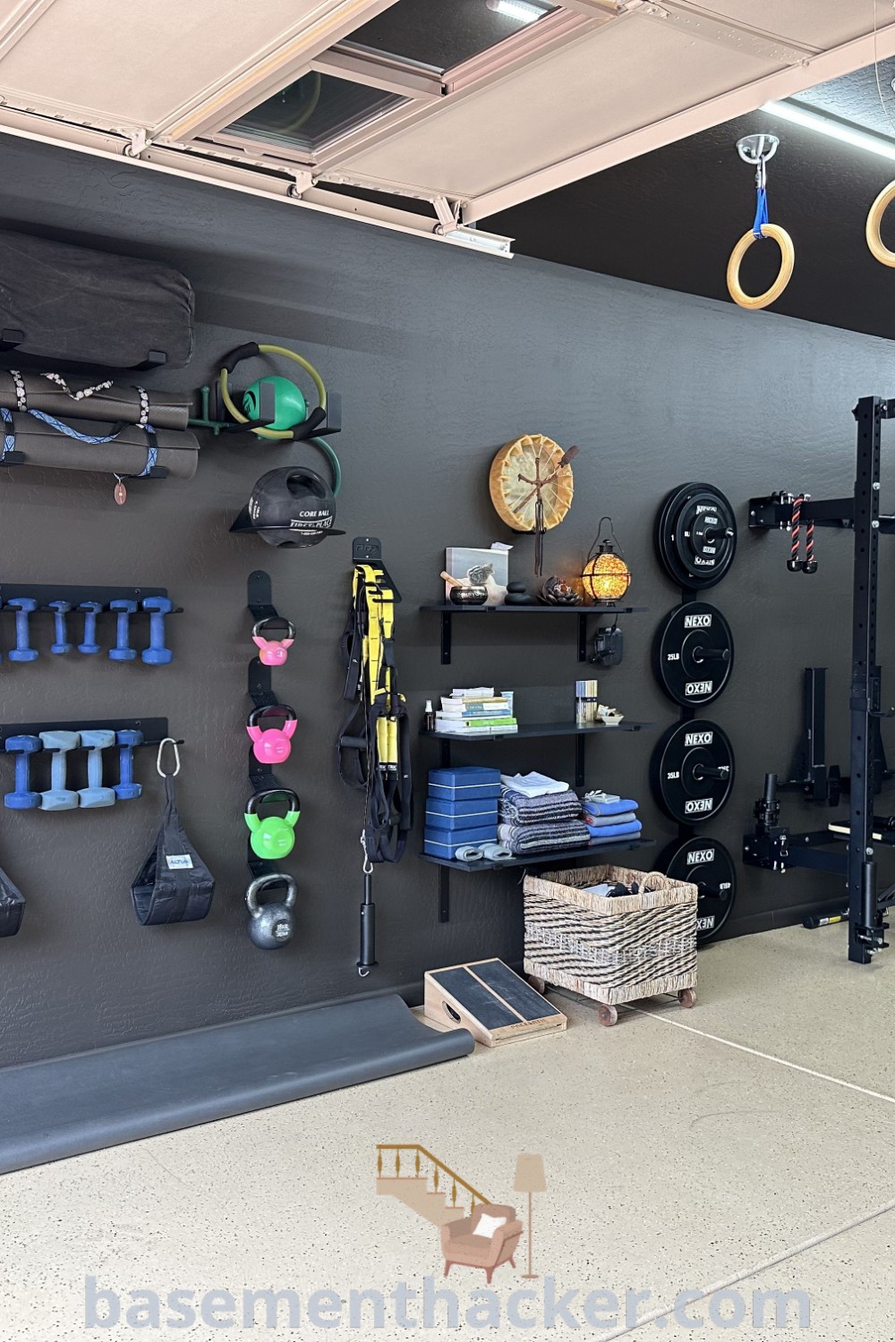 A creative garage gym that blends workout space with workshop functionality, featuring various equipment on the wall and innovative ideas for designing an inviting area. Discover stylish bonus room design ideas for families and see more at basementhacker.com.
