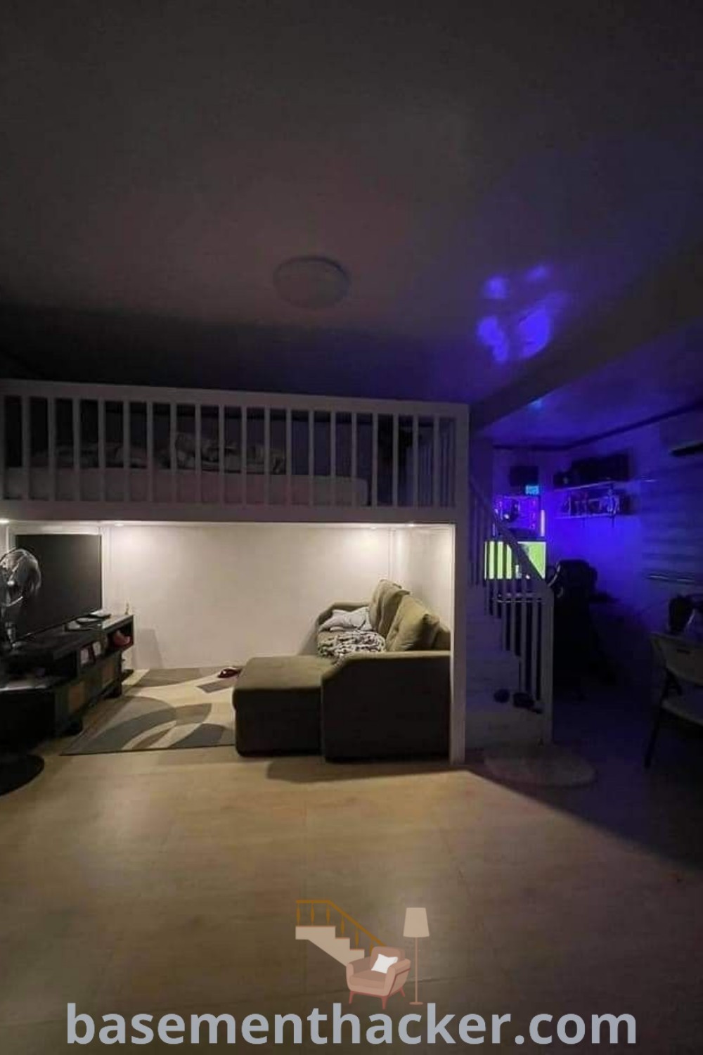 A contemporary gaming bedroom with blue lights above a stylish bunk bed, showcasing cozy furniture and innovative ideas for shared boys rooms and small bedroom spaces. Discover more inspiration at basementhacker.com.