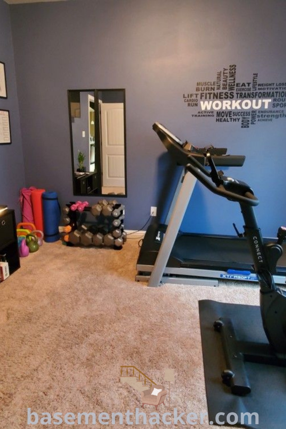 A modern home gym in the basement featuring an exercise bike and treadmill, showcasing innovative ideas for designing a stylish and functional workout space. Find inspiration for your gym basement at basementhacker.com.