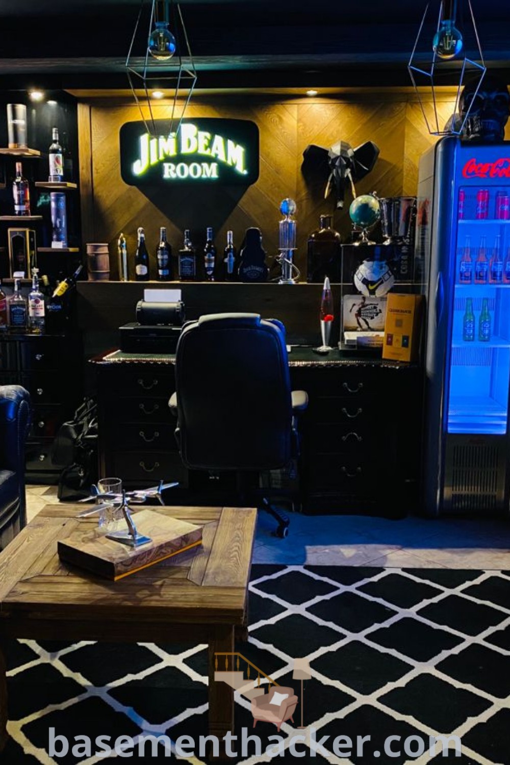 A stylish living room filled with modern furniture and an inviting bar area, featuring innovative ideas for a cozy and organized home. This chic space showcases mood boards and pins for basement makeovers, making it an ideal setting for ultimate entertaining. Discover more design ideas at basementhacker.com.